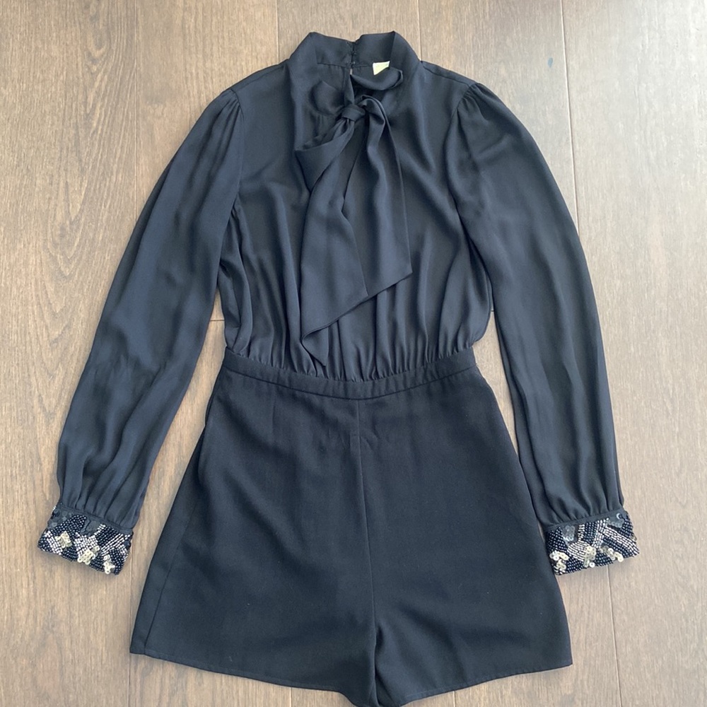 Long Sleeved Black Romper with Embellished Cuffs